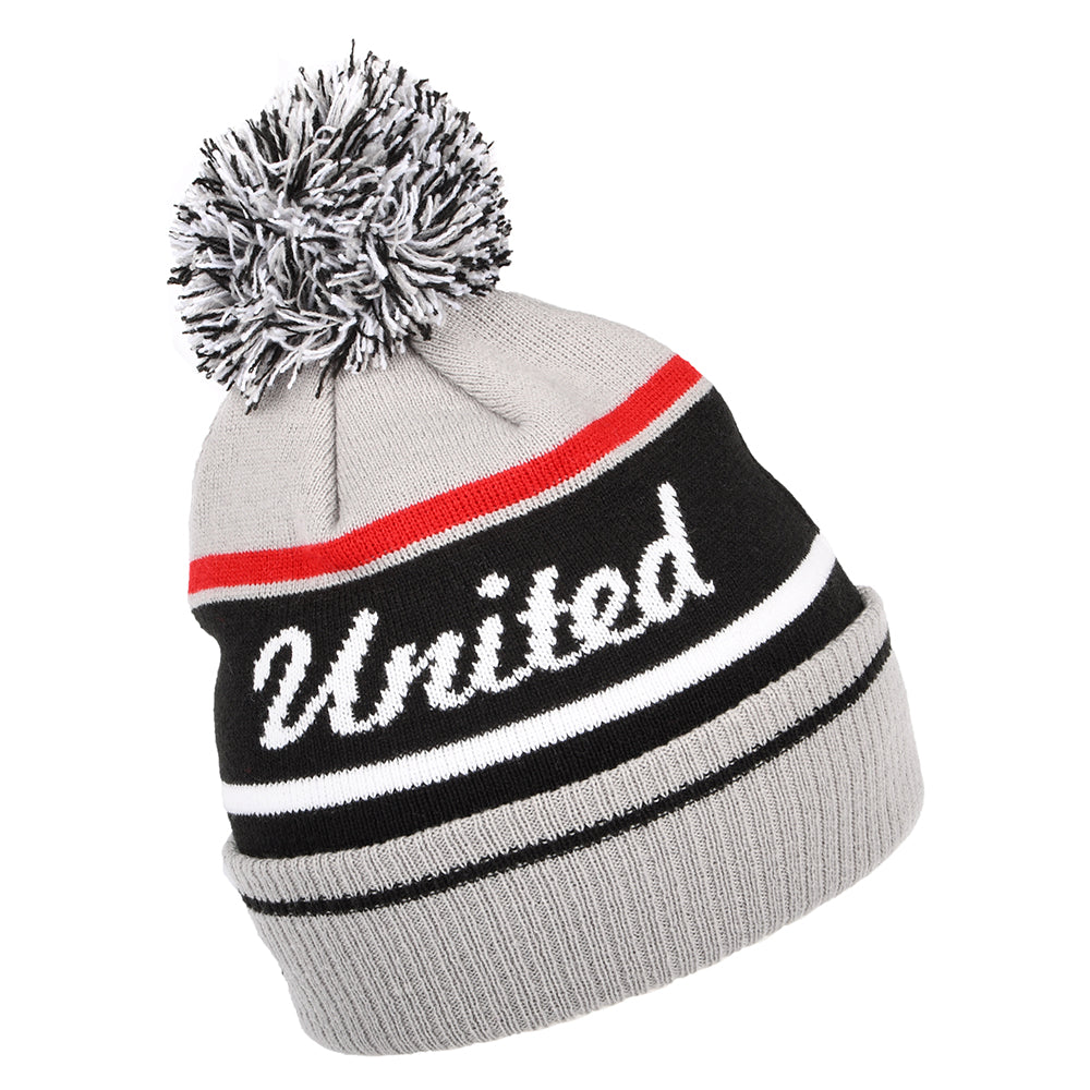 Gorro con pompón Vuelta Tejida Wordmark Manchester United de New Era - Gris-Negro