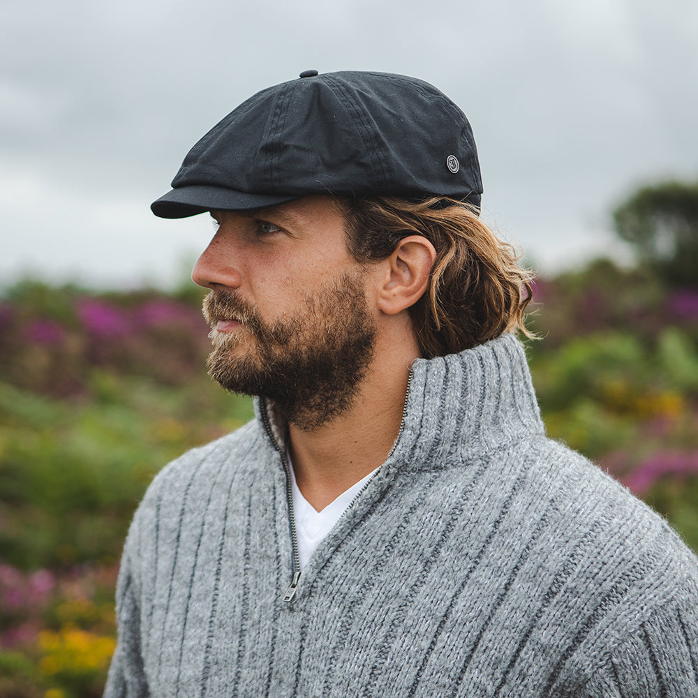 Gorra Newsboy resistente al agua de resistencia al agua de Jaxon & James - Negro