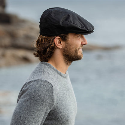 Gorra plana resistente al agua de resistencia al agua de Jaxon & James - Negro