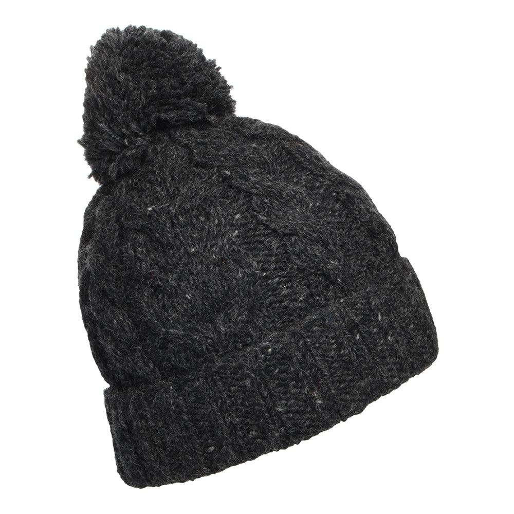 Gorro con pompón con vuelta de punto trenzado de Kusan - Antracita